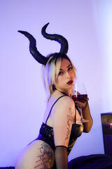 Wanna meet the devil in person? This sexy blonde is all about rough and being a Dominatrix. Are you the submissive type? Check her out!